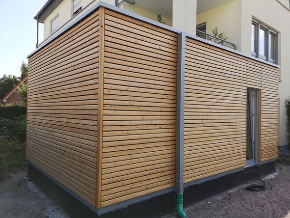 Anbau mit Trendliner-Fassade